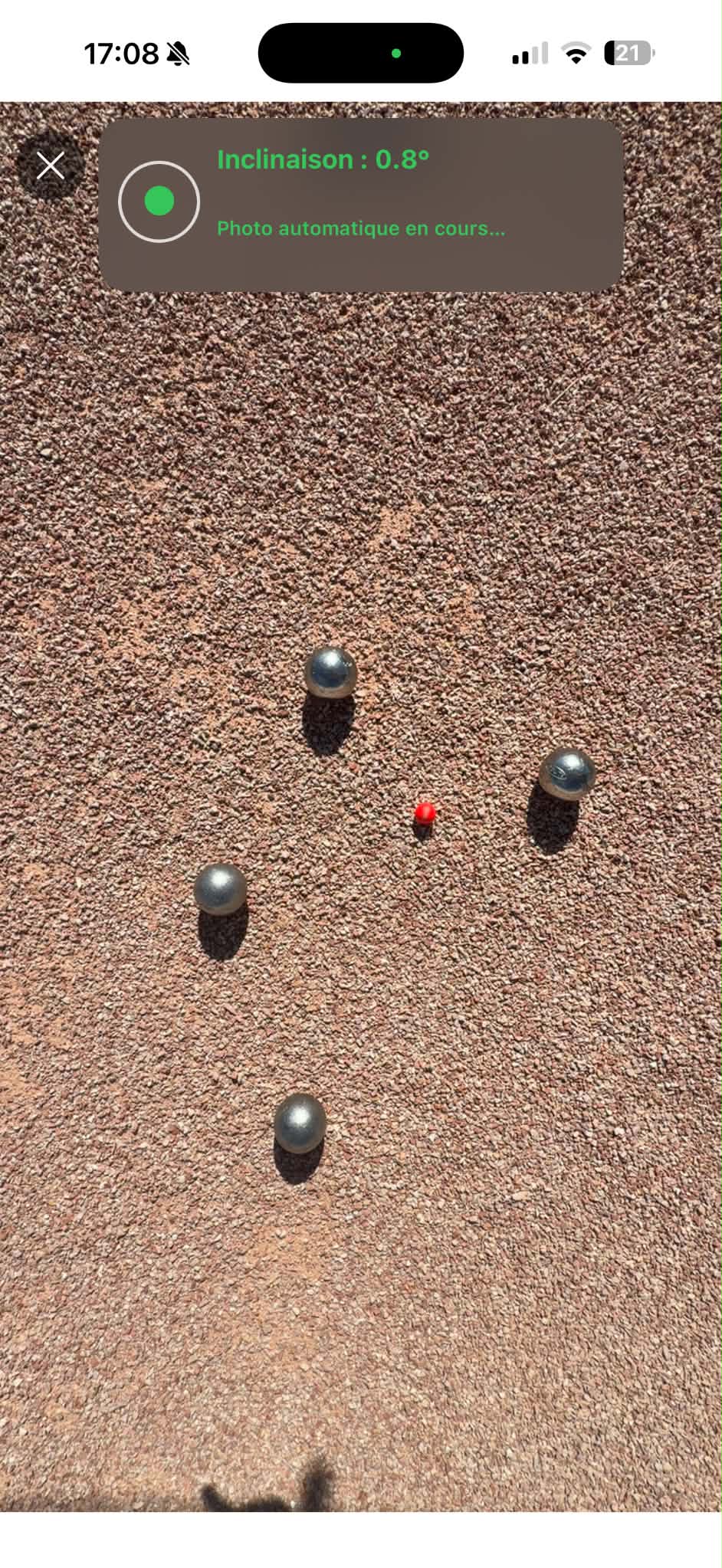 Prise de vue automatique dans l’application : niveau d’inclinaison et boules autour du cochonnet